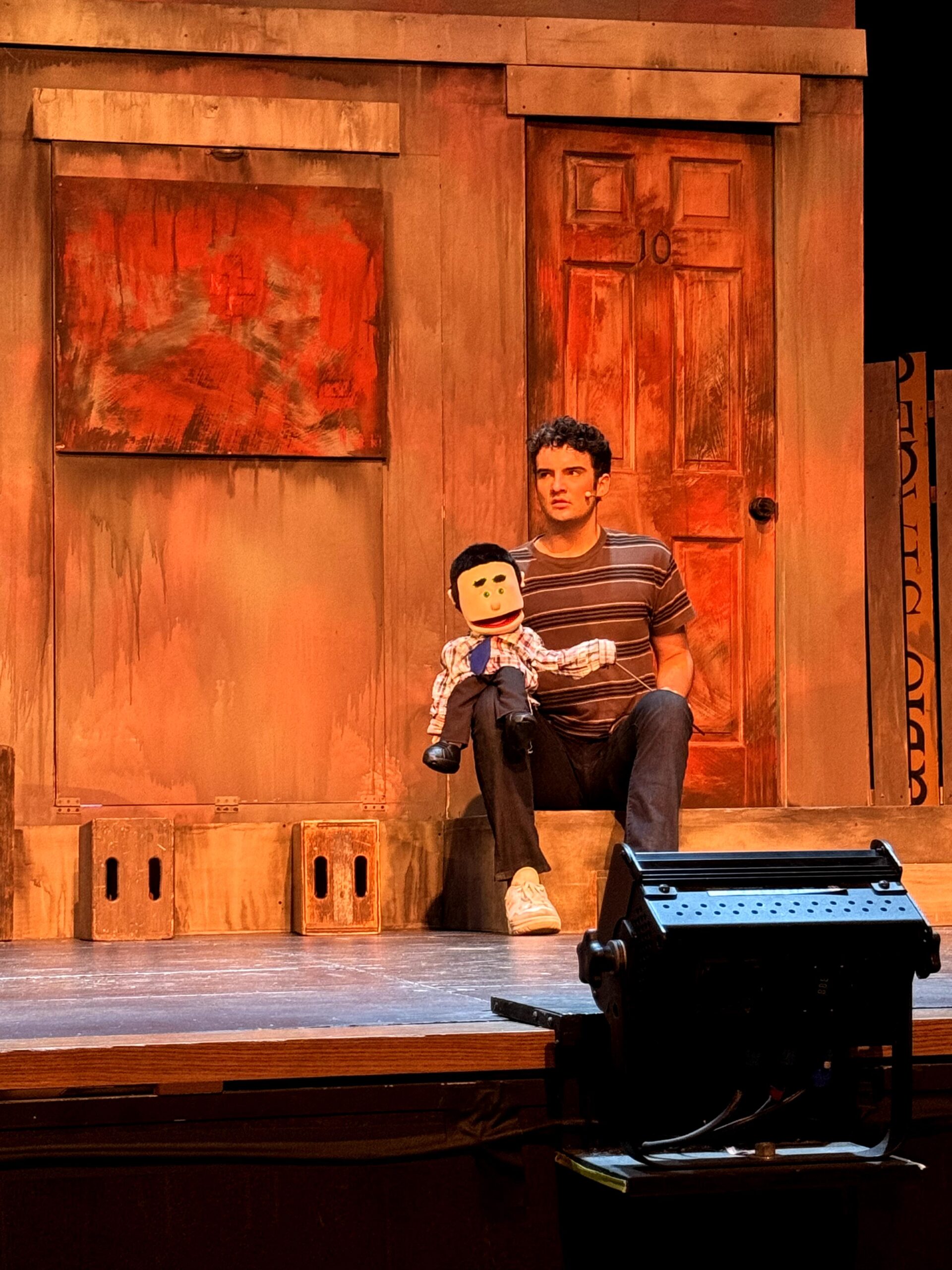 Peyton Farmer performing in Avenue Q